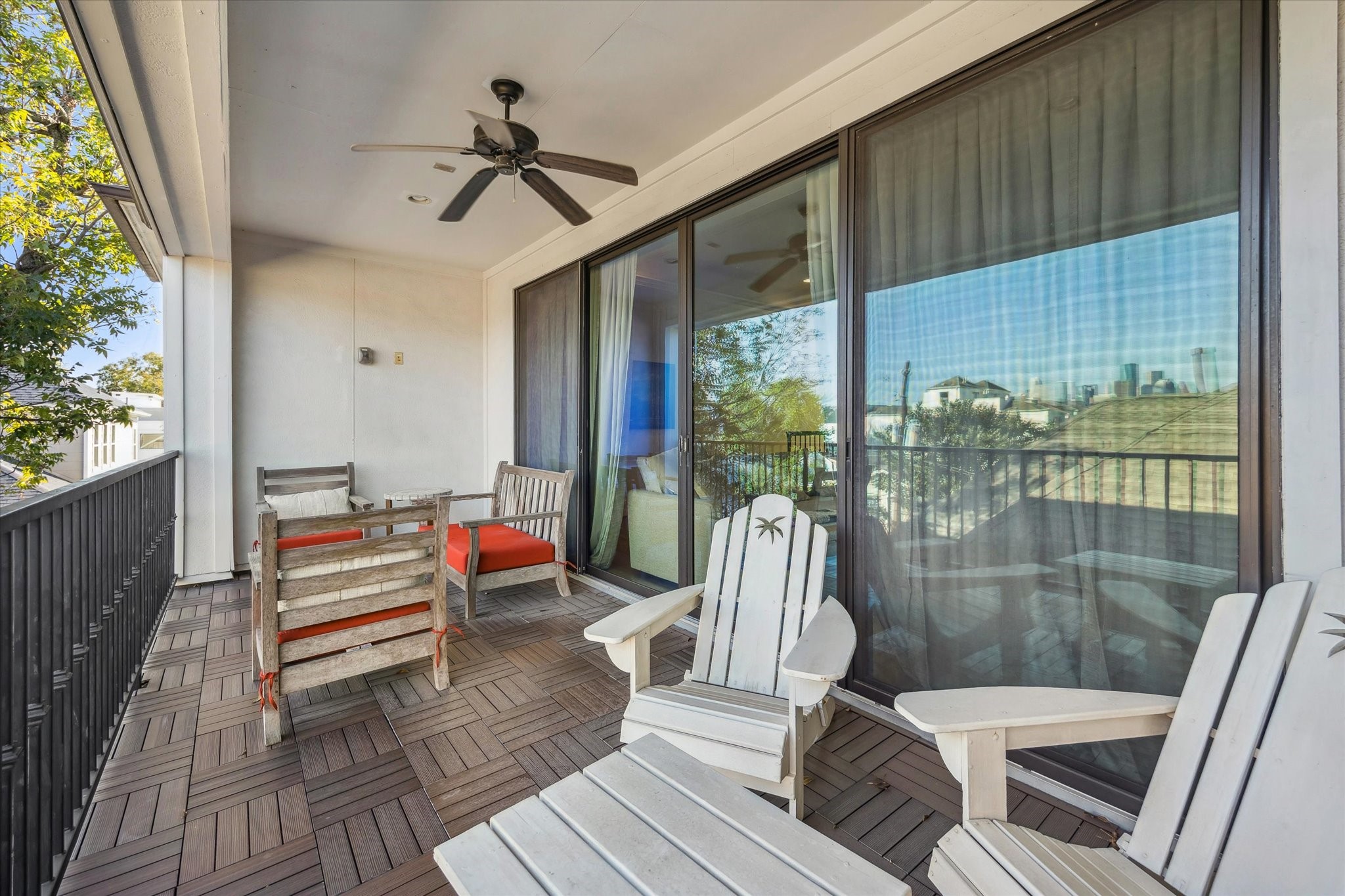 1547 Nevada Street Houston, TX 77006 - Photo 23 of 24 a view of sitting area with furniture and wooden deck