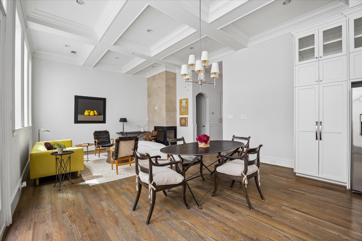 1547 Nevada Street Houston, TX 77006 - Photo 7 of 23 a view of a dining room with furniture and wooden floor