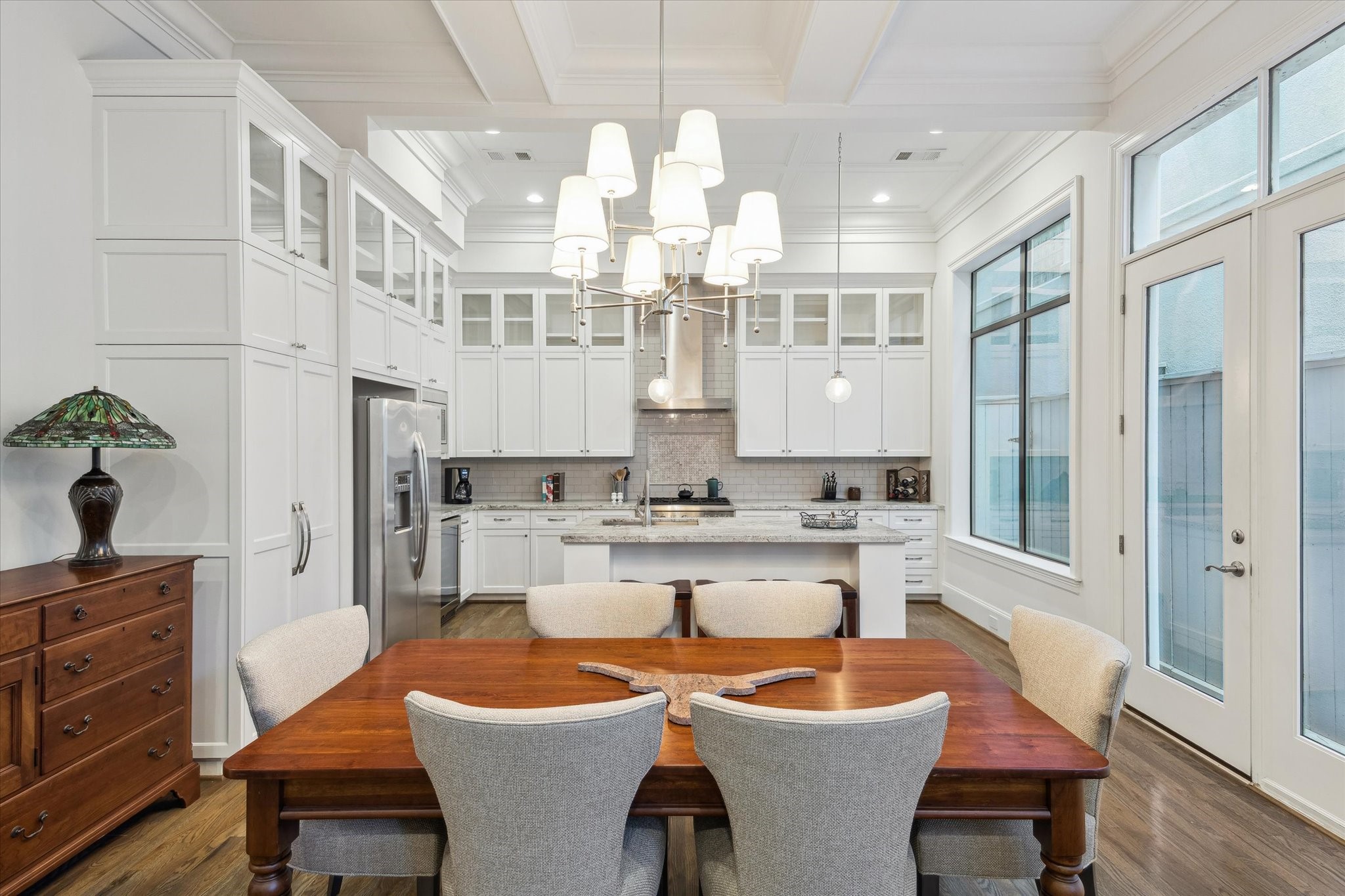 1547 Nevada Street Houston, TX 77006 - Photo 8 of 24 a large kitchen with a table and chairs