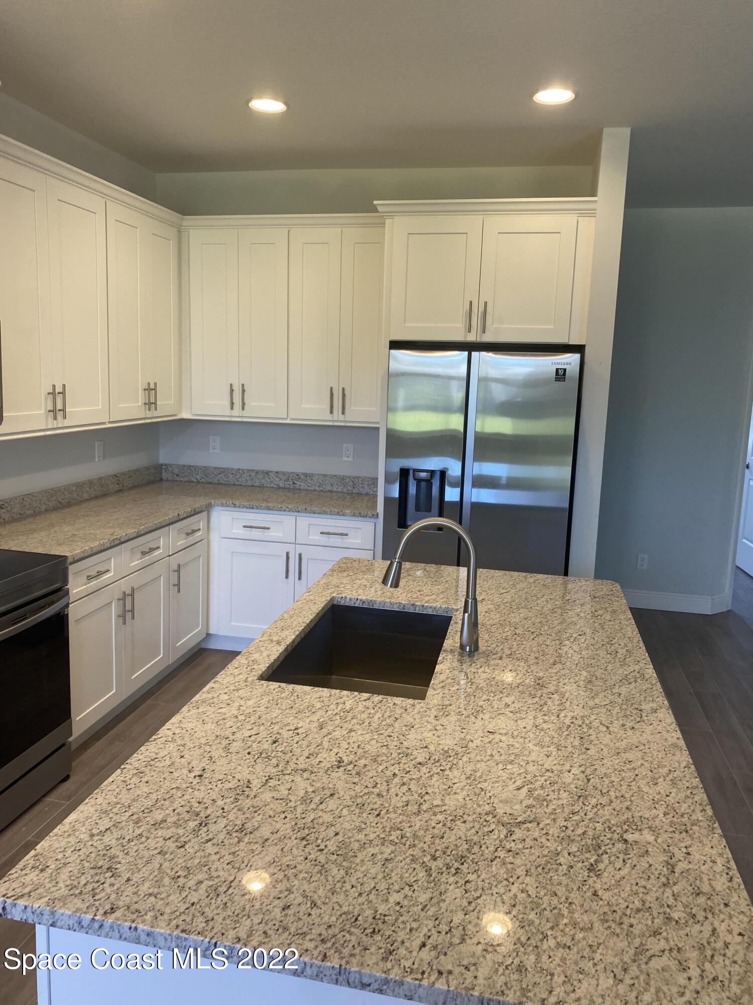 1180 Pasadena Road Southeast Palm Bay, FL 32909 - Photo 5 of 17 kitchen 2