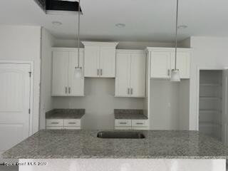 1180 Pasadena Road Southeast Palm Bay, FL 32909 - Photo 7 of 17 kitchen 2