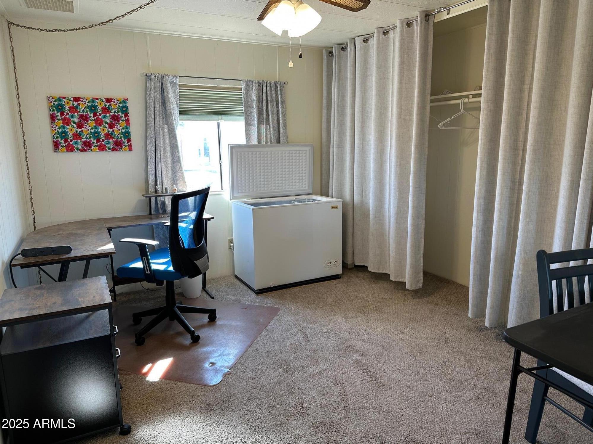 2100 North Trekell Road, Unit 222 Casa Grande, AZ 85122 - Photo 16 of 26 a view of a livingroom with furniture and a window