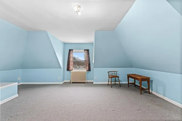 a workspace with furniture and window