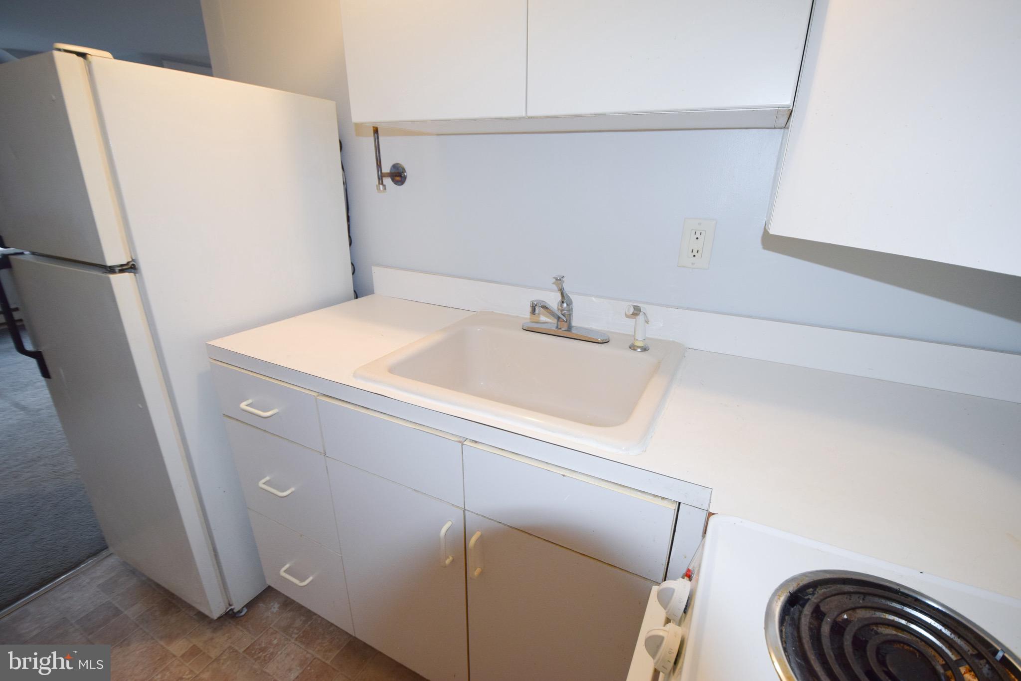 1224 Rustic Avenue Rosedale, MD 21237 - Photo 33 of 41 Garage Loft Kitchen