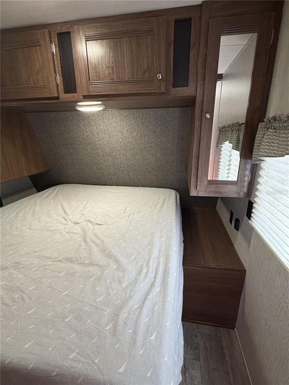 3000 Clarcona Road, Unit 743 Apopka, FL 32703 - Photo 35 of 54 a bed sitting in a kitchen next to a window
