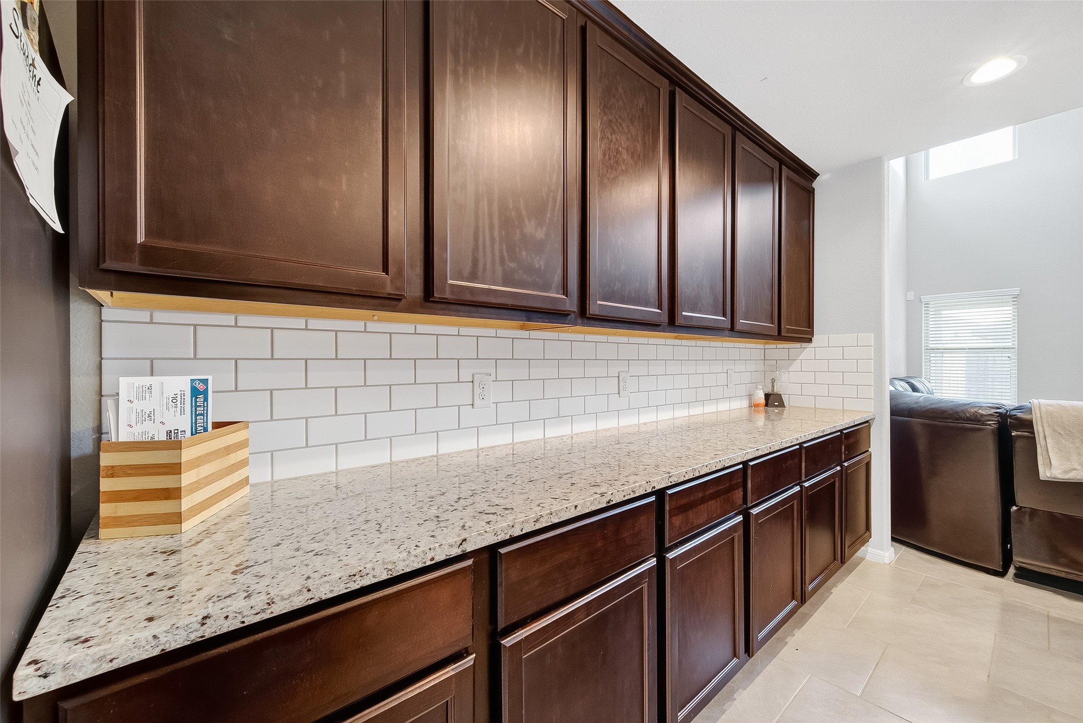 8007 Carillon Way Rosharon, TX 77583 - Photo 14 of 33 a kitchen with stainless steel appliances granite countertop wooden cabinets a sink and dishwasher