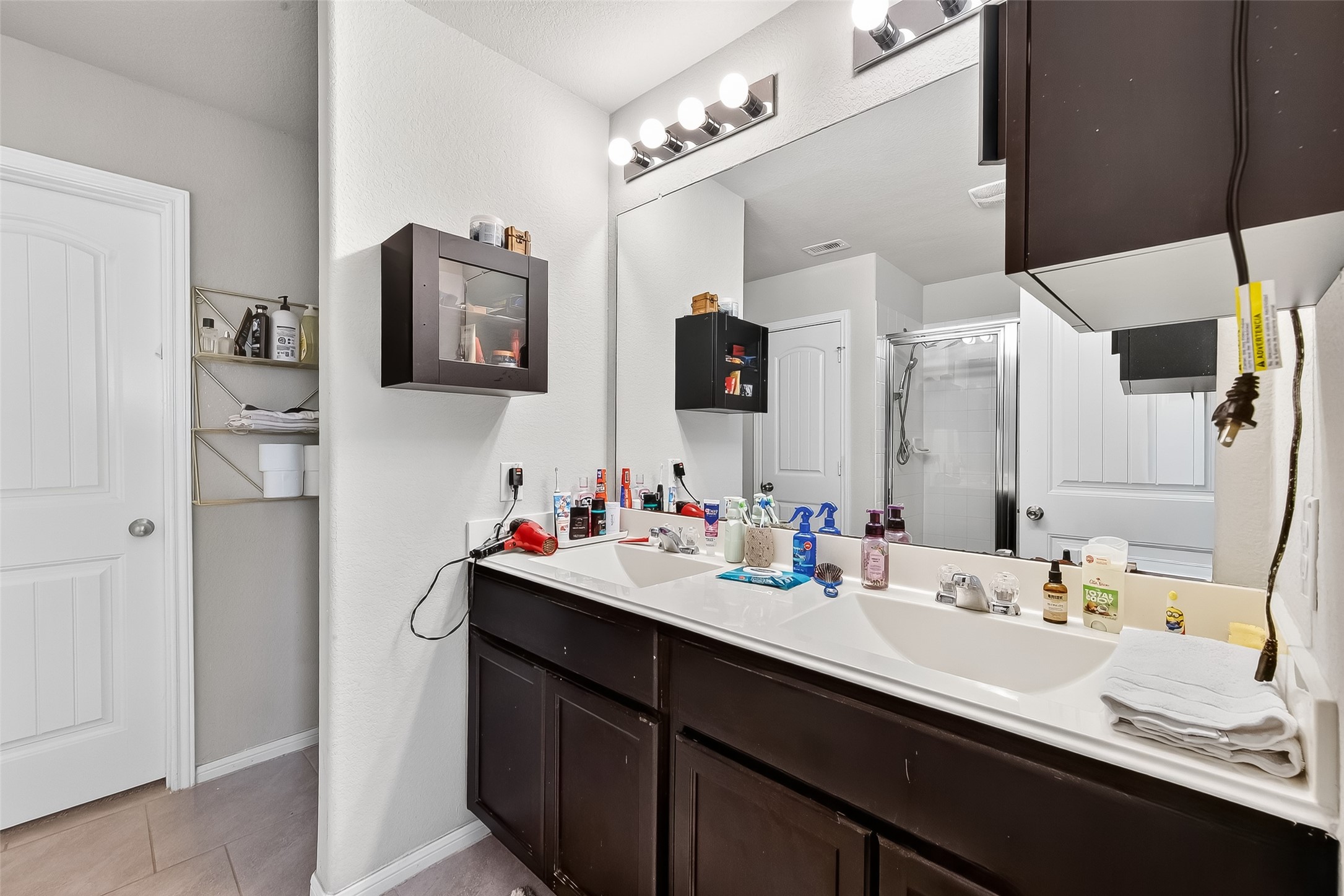 8007 Carillon Way Rosharon, TX 77583 - Photo 20 of 33 a bathroom with a sink double vanity and a mirror