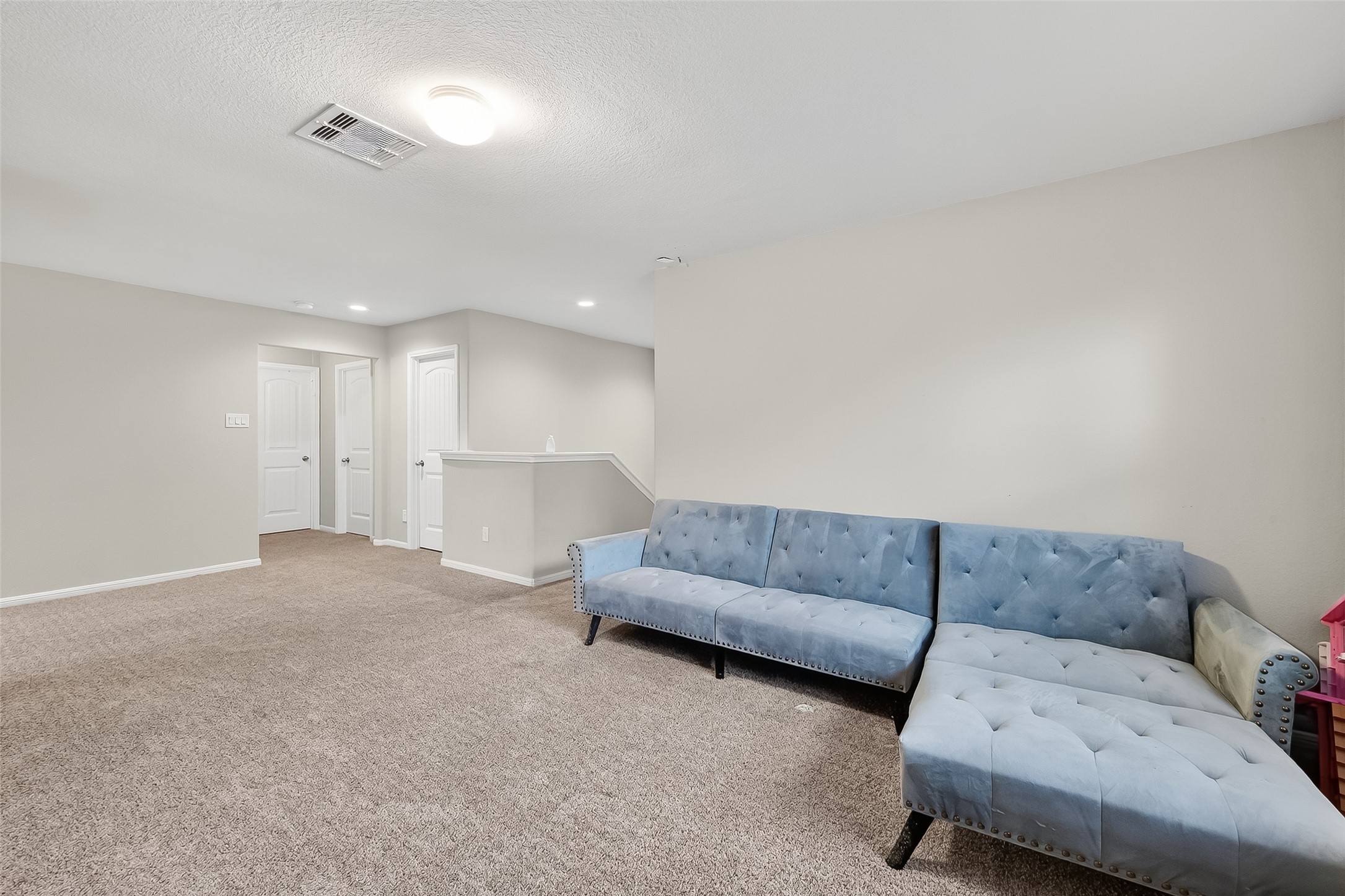 8007 Carillon Way Rosharon, TX 77583 - Photo 23 of 33 a living room with furniture and a couch