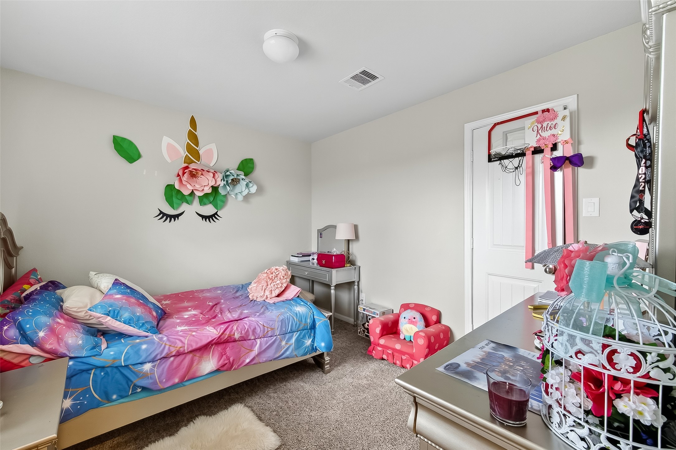 8007 Carillon Way Rosharon, TX 77583 - Photo 25 of 33 a bedroom with a bed and toys