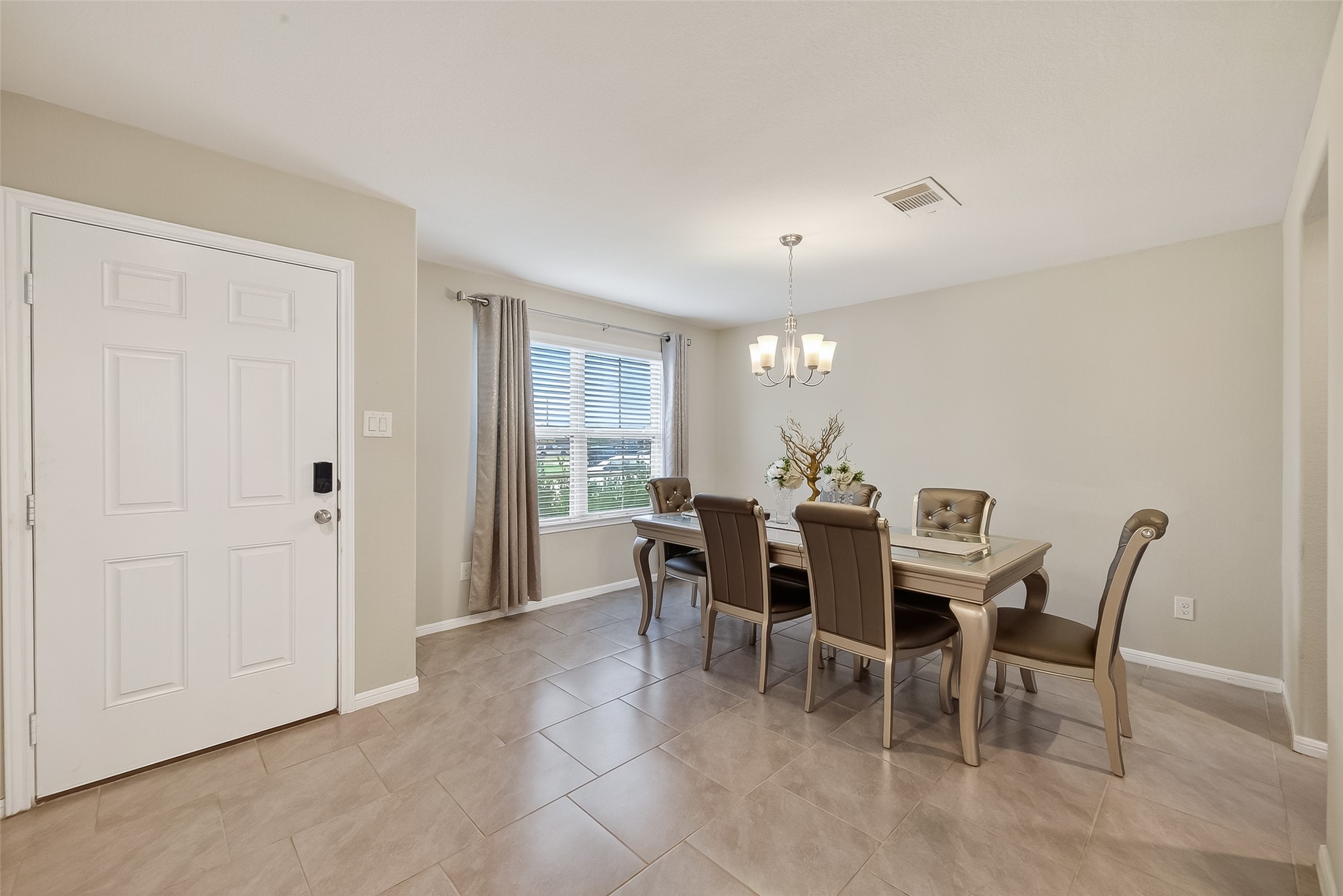 8007 Carillon Way Rosharon, TX 77583 - Photo 3 of 33 a view of a dining room with furniture