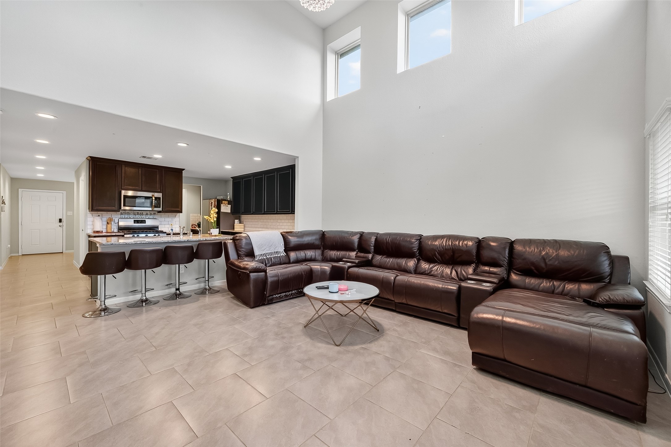 8007 Carillon Way Rosharon, TX 77583 - Photo 7 of 33 a living room with furniture and a flat screen tv