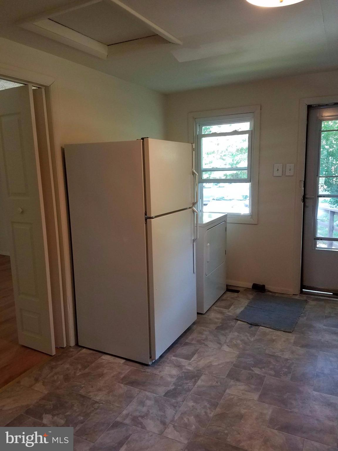 4449 Mountville Road Frederick, MD 21703 - Photo 6 of 29 Kitchen Doors to outside and Bedroom
