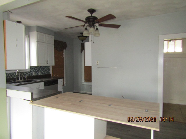 2334 18th Avenue Moline, IL 61265 - Photo 11 of 49 a kitchen with a refrigerator a stove and a sink