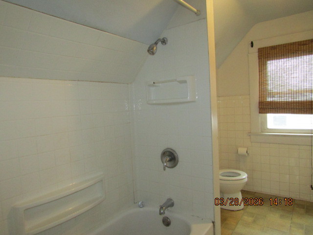 2334 18th Avenue Moline, IL 61265 - Photo 19 of 49 a bath room with a toilet and a bath tub