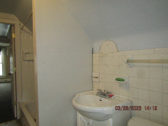 2334 18th Avenue Moline, IL 61265 - Photo 20 of 49 a bathroom with a sink and a mirror