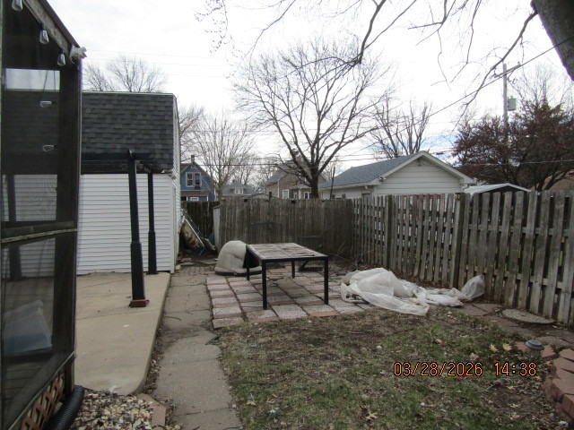 2334 18th Avenue Moline, IL 61265 - Photo 22 of 49 a view of a chairs and table in backyard