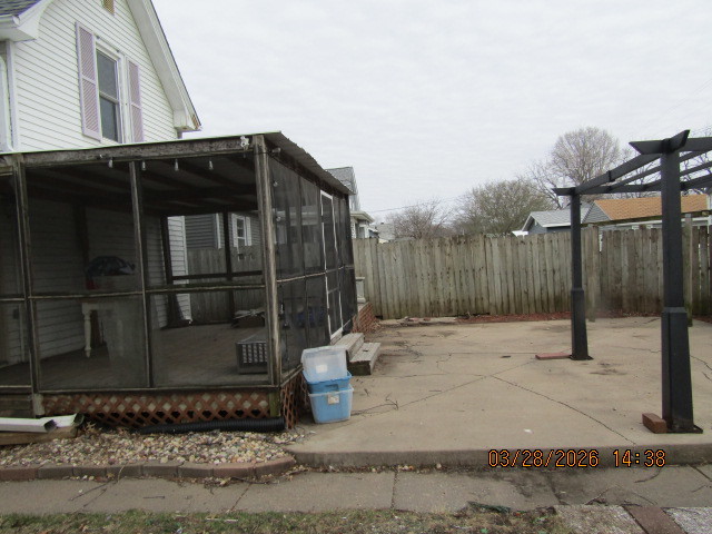 2334 18th Avenue Moline, IL 61265 - Photo 24 of 49 a backyard of a house with table and chairs