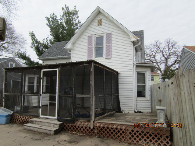 2334 18th Avenue Moline, IL 61265 - Photo 27 of 49 a view of a house with a door and wooden fence