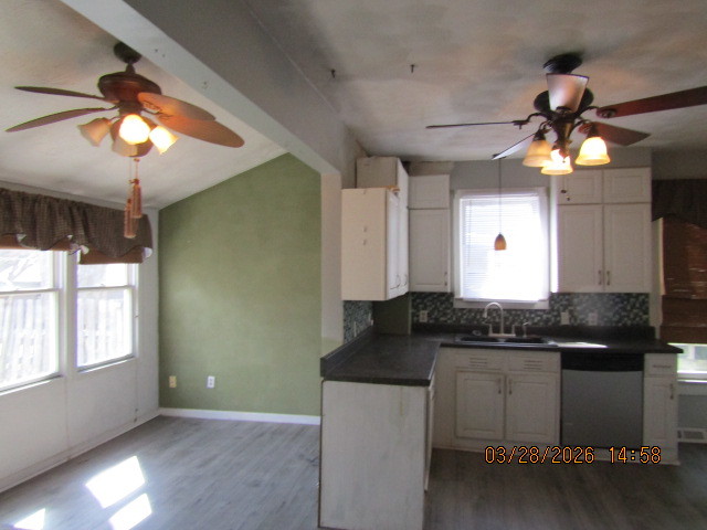 2334 18th Avenue Moline, IL 61265 - Photo 37 of 49 a kitchen with a counter space a sink appliances and a window