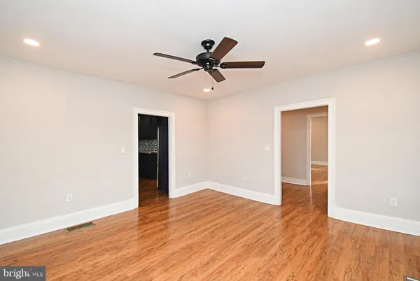 a kitchen with stainless steel appliances a stove a sink and a microwave