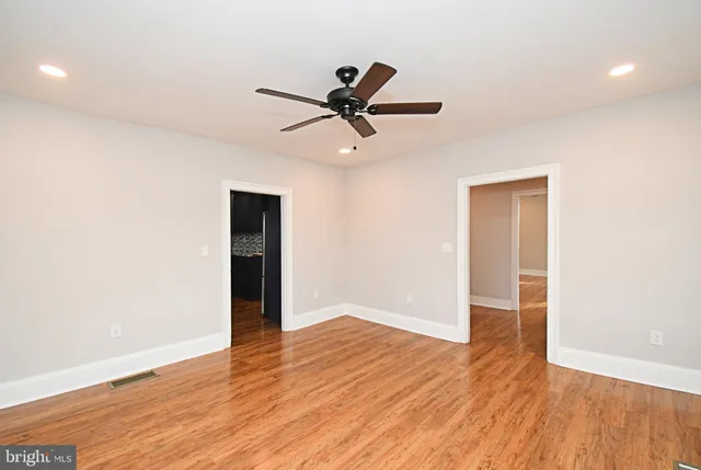 a kitchen with stainless steel appliances a stove a sink and a microwave