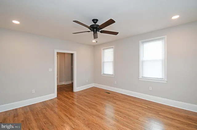 a kitchen with granite countertop stainless steel appliances and wooden cabinets
