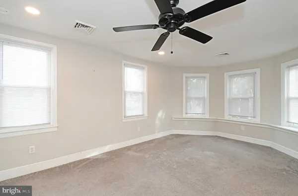 a view of hallway with stairs