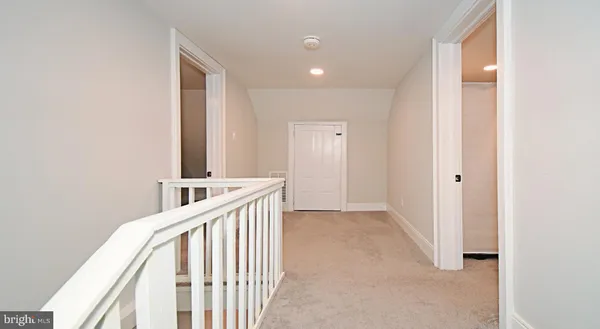 a view of house with outdoor space and street