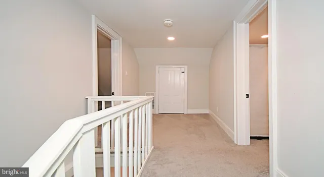 a view of house with outdoor space and street