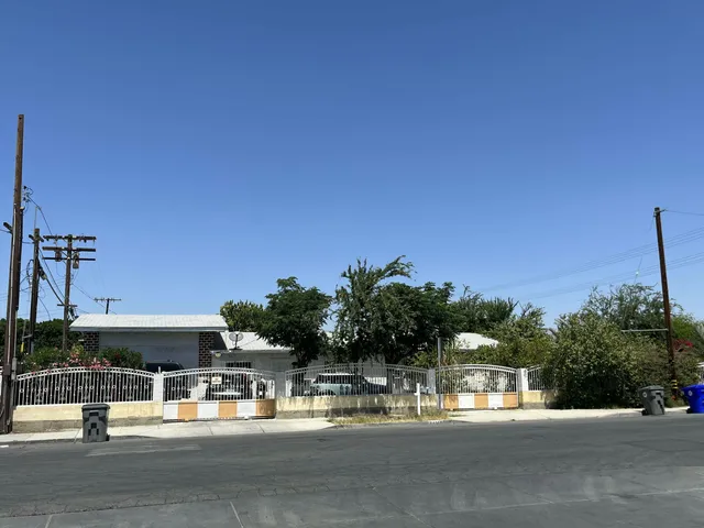 a view of a swimming pool with outdoor seating
