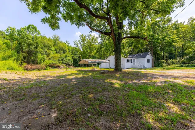 a view of a house with swimming pool
