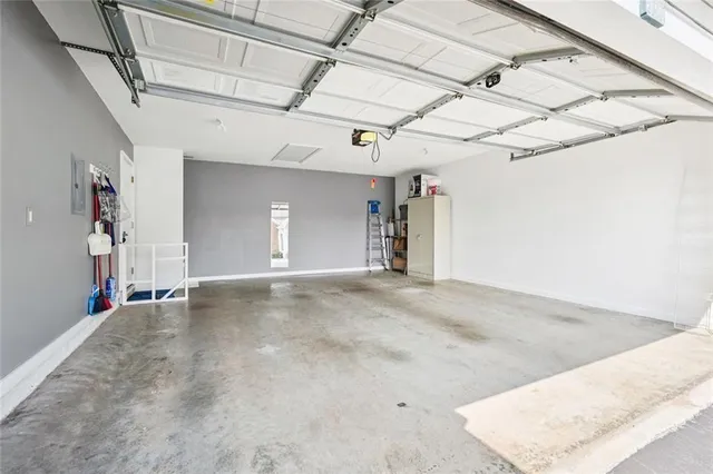 a view of a room with furniture and a garage