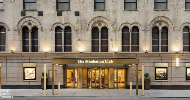 a front view of a building with windows