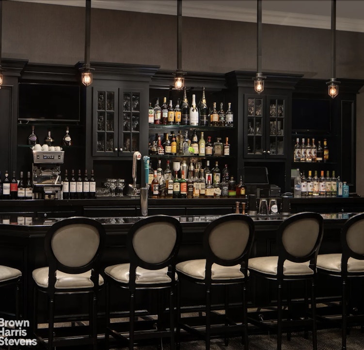 200 West 56th Street, Unit 1705 Manhattan, NY 10019 - Photo 7 of 12 a table and chairs in a room