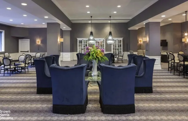 a view of a living room with furniture