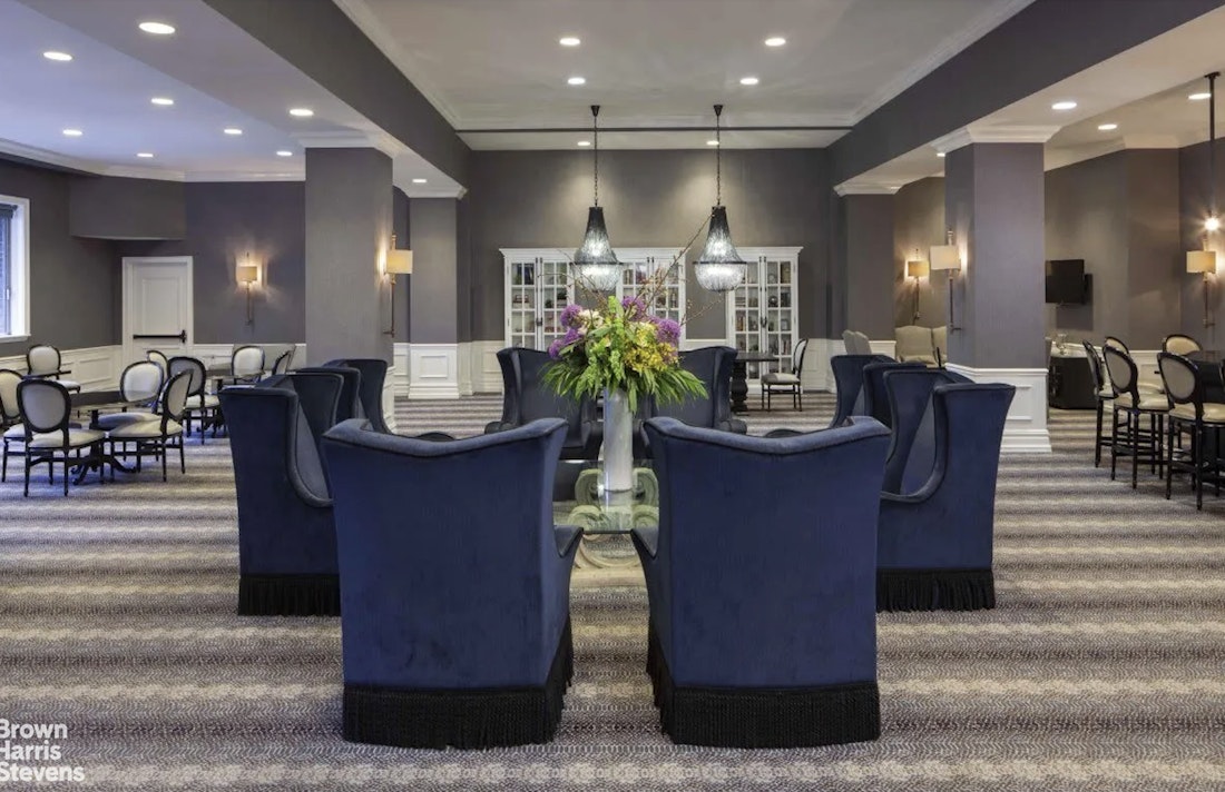 200 West 56th Street, Unit 1705 Manhattan, NY 10019 - Photo 8 of 12 a view of a dining room with furniture