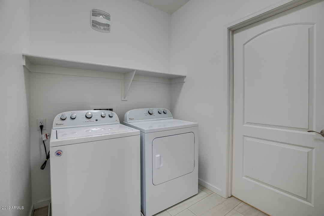 3900 East Baseline Road, Unit 114 Phoenix, AZ 85042 - Photo 26 of 31 a utility room with dryer and washer