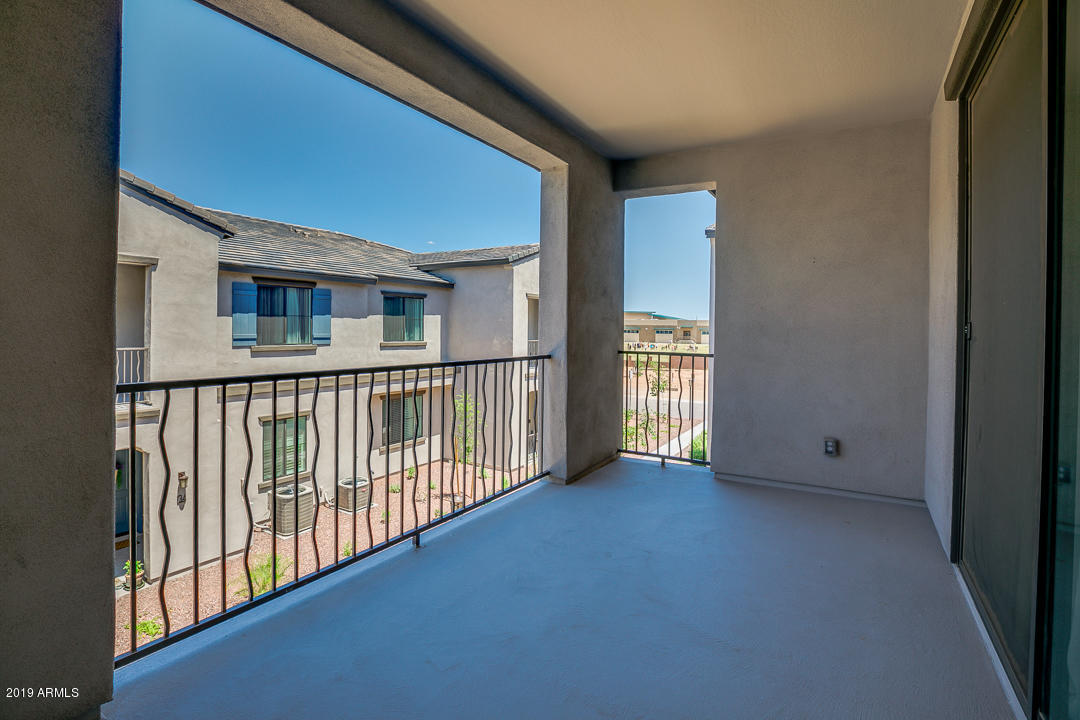 3900 East Baseline Road, Unit 114 Phoenix, AZ 85042 - Photo 30 of 31 a view of a porch in front of a house