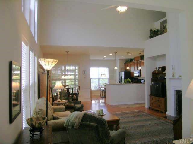 3405 Parlor Street Raleigh, NC 27614 - Photo 2 of 10 a living room with furniture and a table