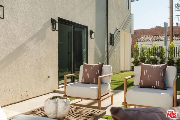 a kitchen with sink cabinets and window