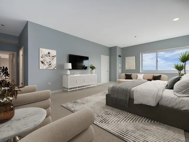 a spacious bedroom with a large bed and a flat screen tv