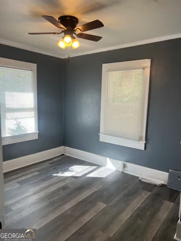 a view of an empty room and window