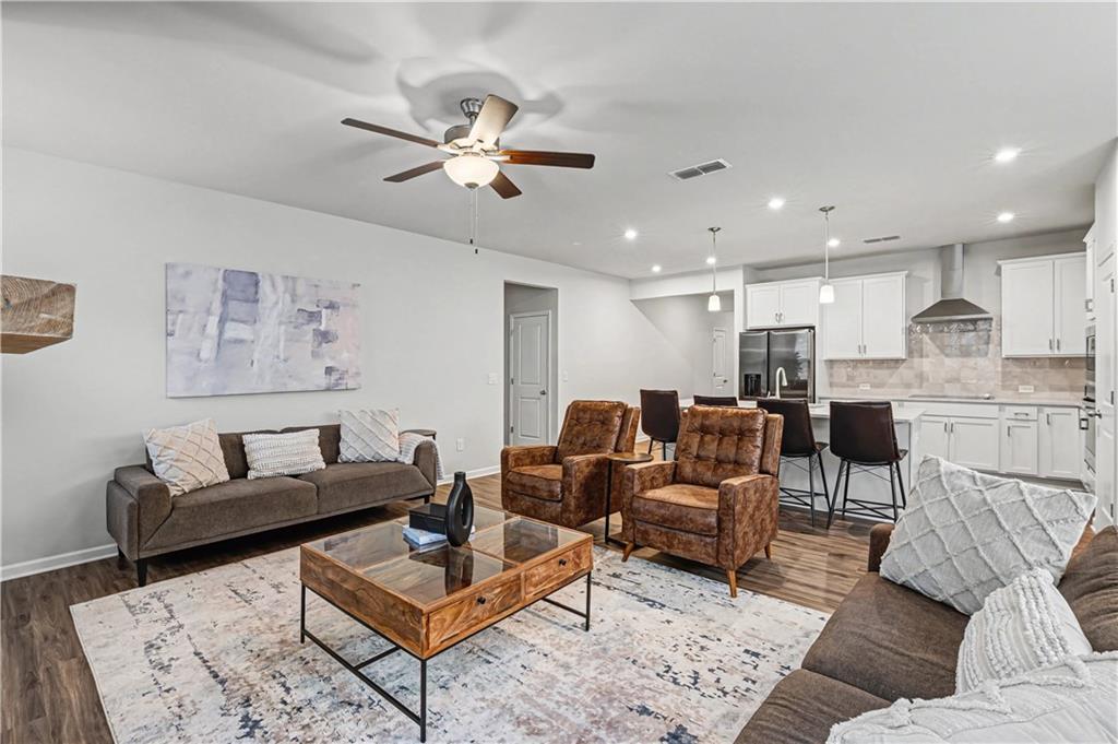 33 Brookside Way Cartersville, GA 30121 - Photo 13 of 54 a living room with furniture and kitchen view