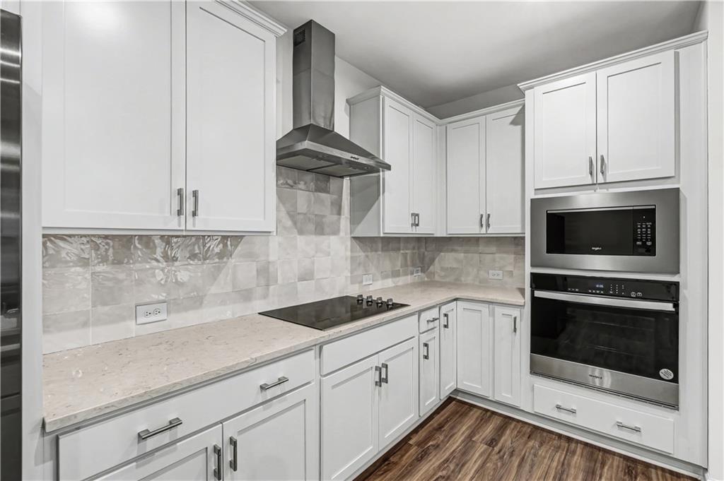 33 Brookside Way Cartersville, GA 30121 - Photo 19 of 54 a kitchen with granite countertop white cabinets stainless steel appliances and sink
