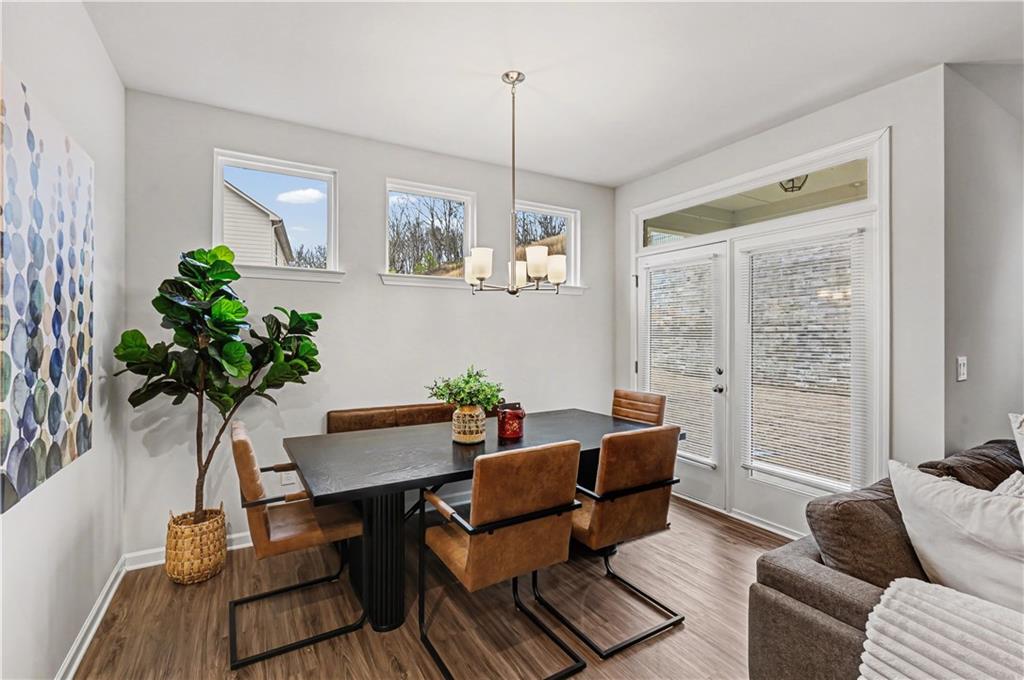 33 Brookside Way Cartersville, GA 30121 - Photo 23 of 54 a living room with furniture potted plant and a window