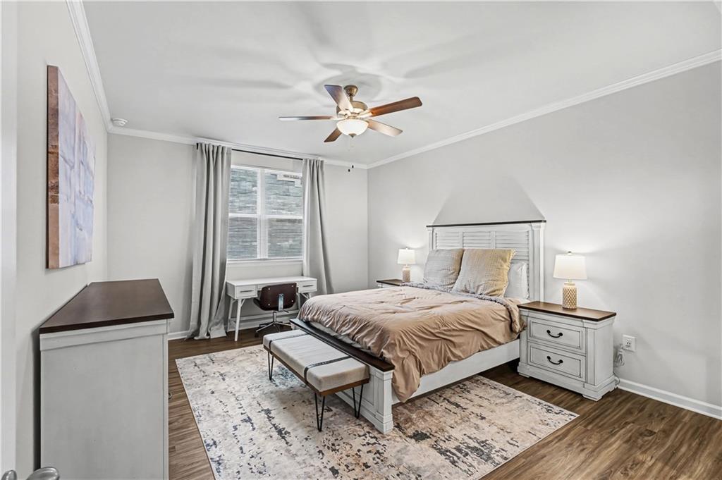 33 Brookside Way Cartersville, GA 30121 - Photo 24 of 54 a bedroom with a bed and wooden floor