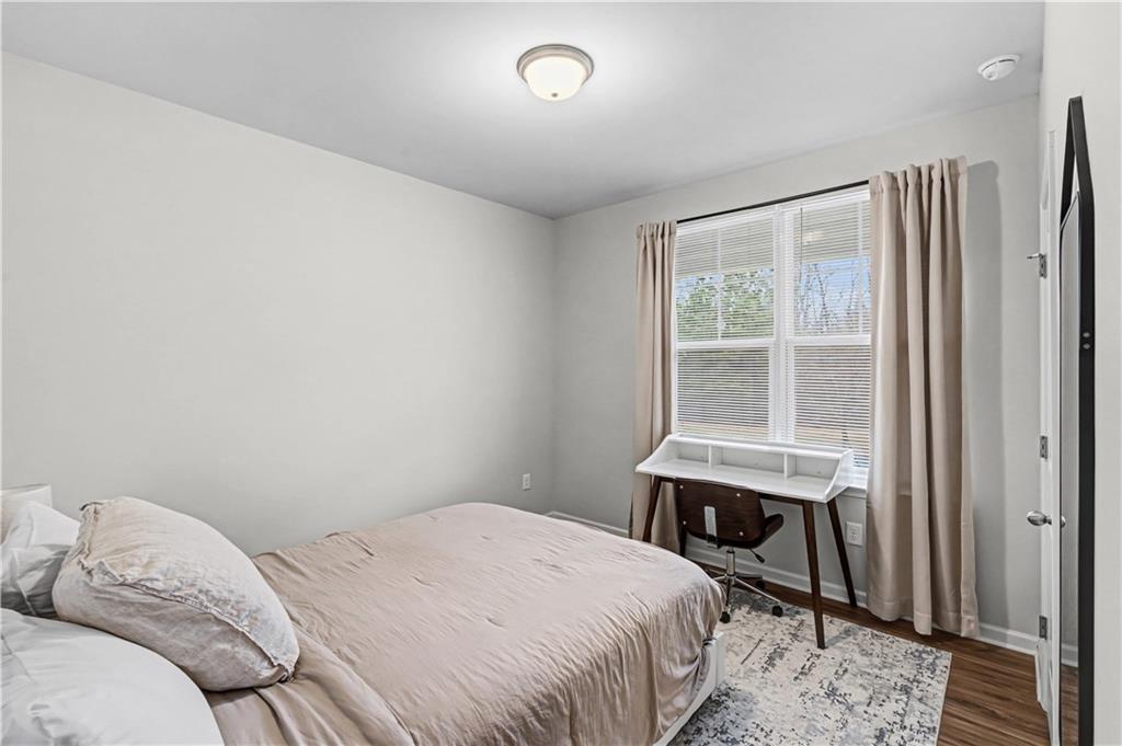 33 Brookside Way Cartersville, GA 30121 - Photo 33 of 54 a bedroom with a bed and a window