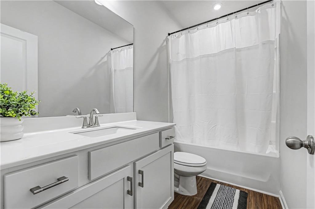 33 Brookside Way Cartersville, GA 30121 - Photo 34 of 54 a bathroom with a sink a toilet and shower