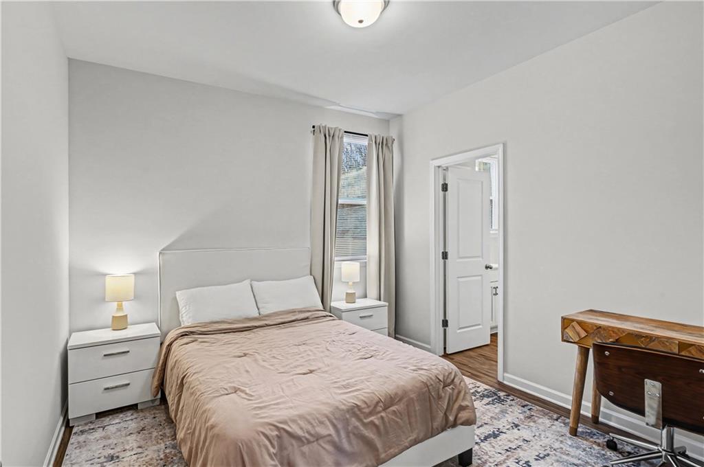 33 Brookside Way Cartersville, GA 30121 - Photo 35 of 54 a bedroom with a bed and a tv