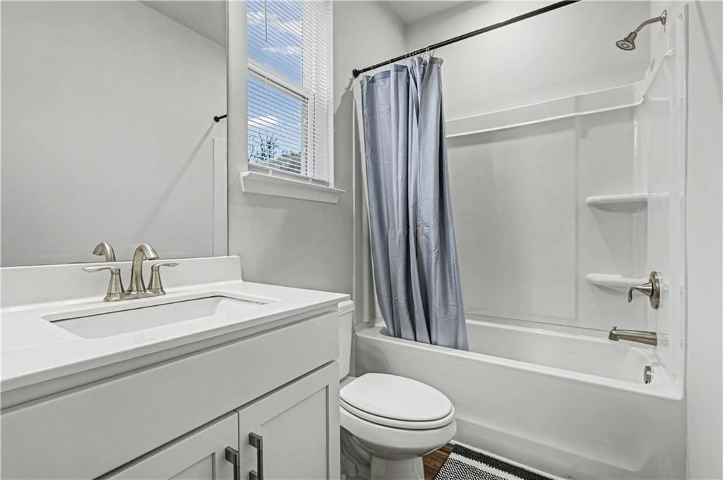 33 Brookside Way Cartersville, GA 30121 - Photo 36 of 54 a bathroom with a sink toilet and shower